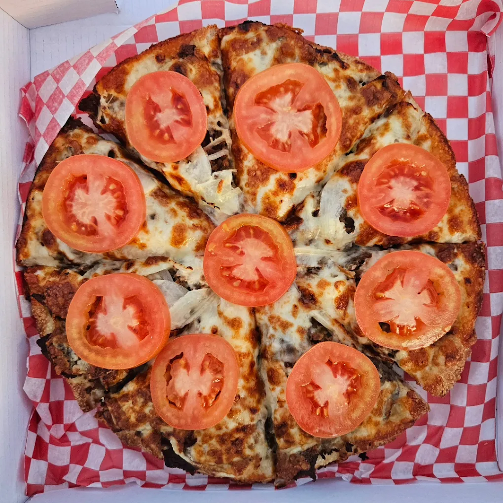 Bacon and ham pizza at Atomic Pizza & Donair Stony Plain, AB